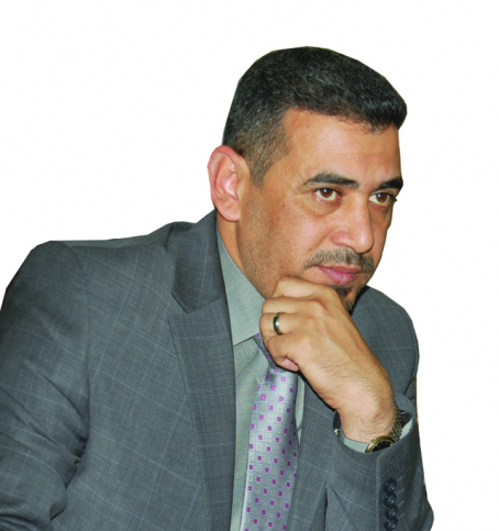 عميد كلية الحلة الجامعة  لـ( الإعلام العراقي )